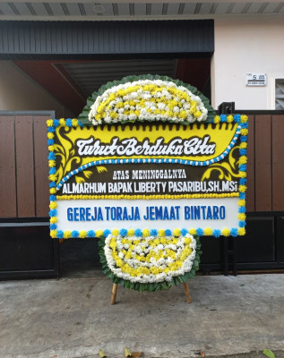 Papan Bunga Duka di Tangkobu